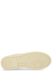 Cream-colored rubber sole with concentric tread and rectangular brand logo on Autry men’s sneaker Medalist low multicolor