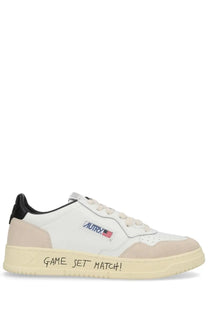 Autry men’s sneaker medalist low beige and white leather low-top with black accents and game set match sole inscription