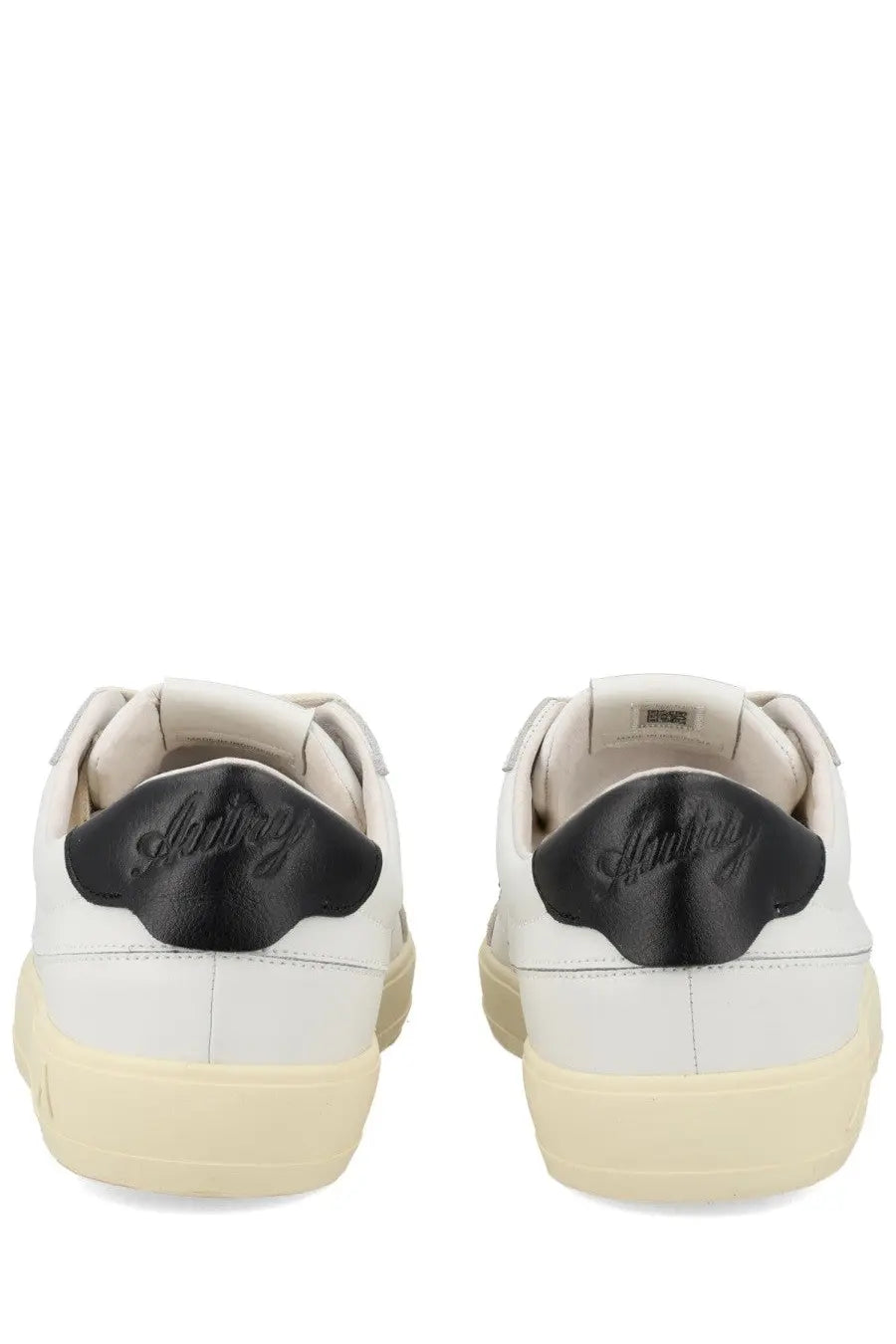Back view of autry men’s sneaker windscape low white leather with black rubber heel tabs embossed gianvito rossi