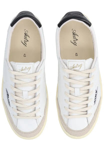 Autry men’s sneaker windscape low white leather with black rubber toe caps and beige suede accents with aubrey insole