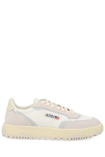 Autry men’s wildpace low sneaker in cream with white and gray suede panels and blue embroidered logo near the toe