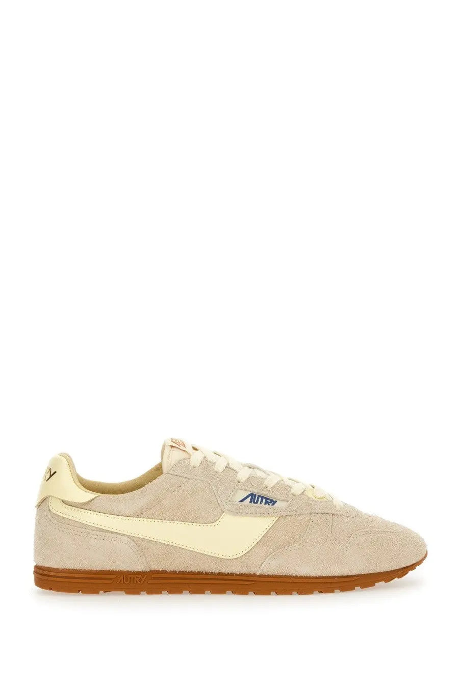 Autry men’s windspin sneaker in beige suede with cream swoosh brown sole and blue amply logo on the side