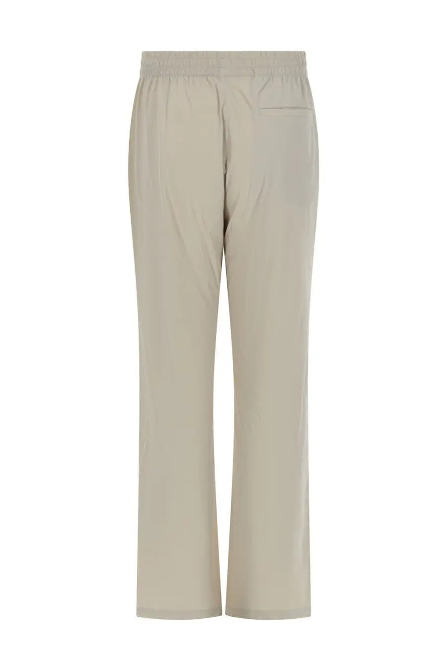 Beige autry unisex sports pants shown from the back with wide-leg cut elastic waistband and single back pocket