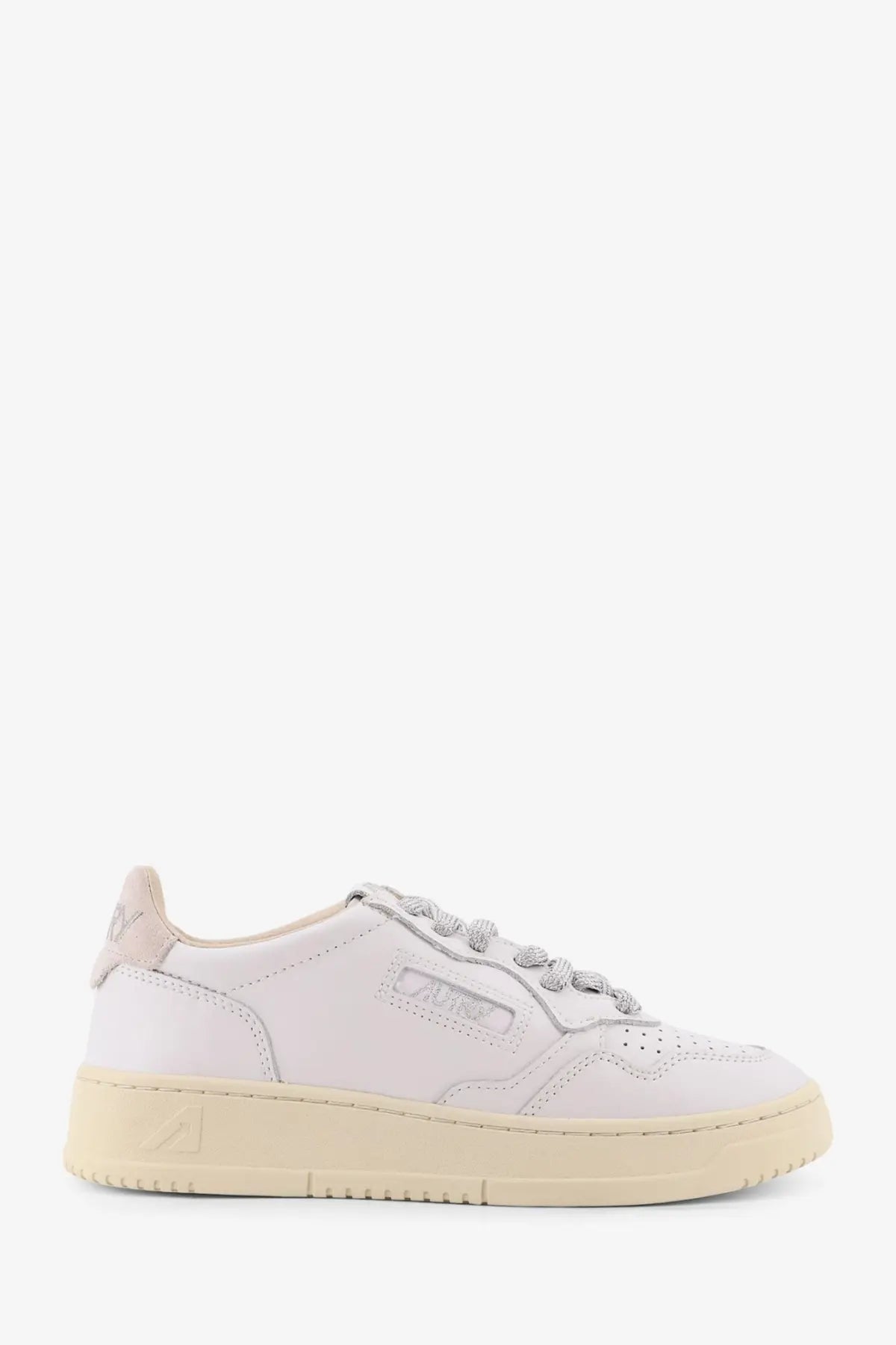 Autry women’s medalist low leather sneaker in white with cream rubber sole and subtle gray laces