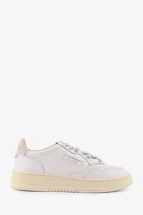 Autry women’s medalist low leather sneaker in white with cream rubber sole and subtle gray laces