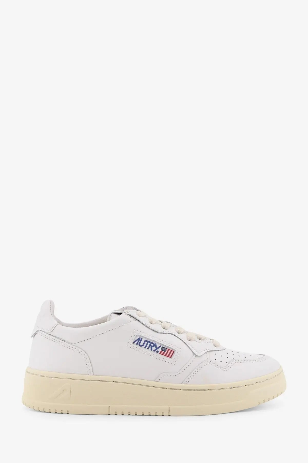 Autry women’s medalist low leather low top sneaker white with cream rubber sole and american flag logo patch