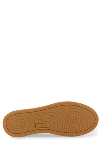 Tan rubber sole with circular tread patterns and autry logo on women’s medalist low sneaker orange