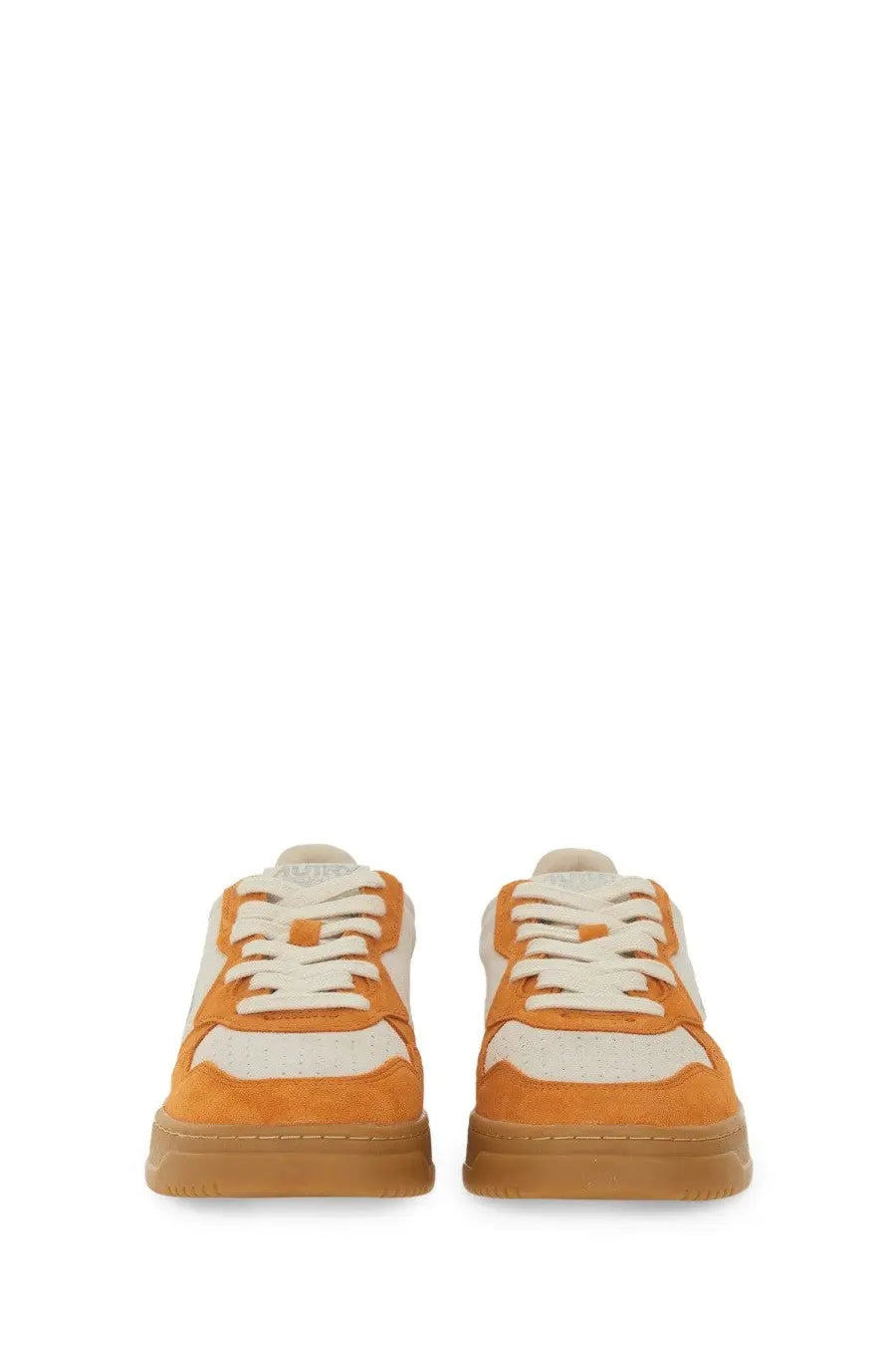 Autry women’s medalist low sneaker in orange and white suede with a gum rubber sole