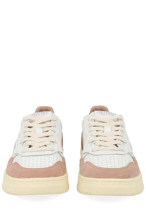 Autry women’s Medalist low sneaker in white with beige suede and leather featuring perforated detailing