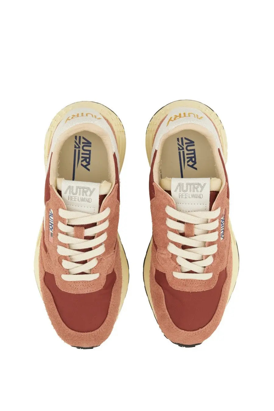 Autry women’s reelwind low sneaker in muted terracotta and cream suede with white laces and chunky sole