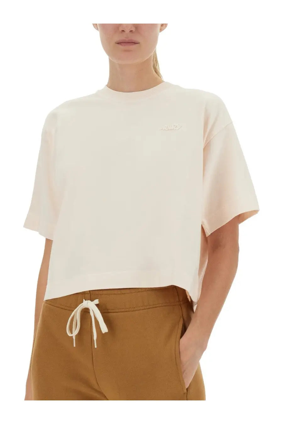 Cream-colored cropped t-shirt with short sleeves and subtle embroidered logo on chest from Autry women’s shirt white collection