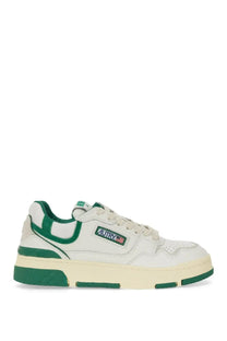 Autry women’s multicolor sneaker with white and green low-top design and chunky sole featuring autry logo on side