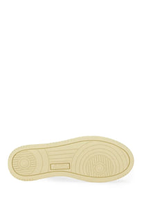 Cream-colored rubber sole with concentric circular tread and rectangular brand logo on autry women’s sneaker medalist low multicolor