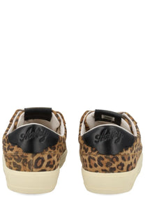 Back view of autry women’s sneaker windscape low pattern leopard print sneakers with black leather heel branding