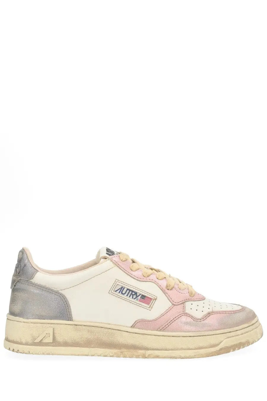 Autry women’s super vintage sneaker in pastel pink and cream with distressed leather finish and autry logo patch