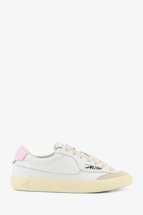 Autry women’s Windscape leather sneakers in white with a pink heel tab and beige rubber sole featuring the autr logo