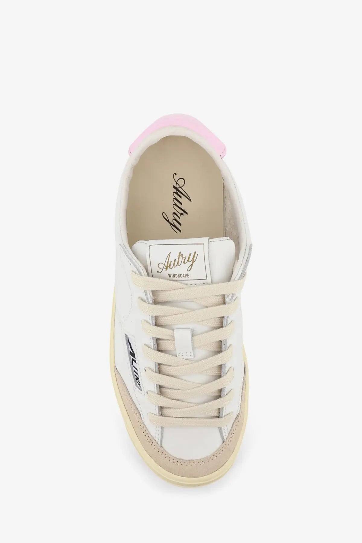 Autry womens windscape leather sneaker in white with pink heel tab beige accents and minimalist branded design