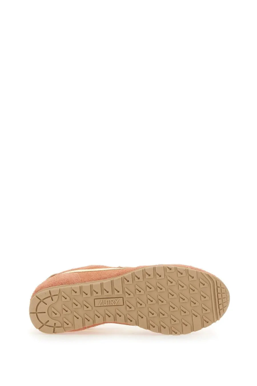 Beige suede puma sneaker with tan rubber sole and classic triangular tread pattern in autry women’s windspin low sneaker multicolor