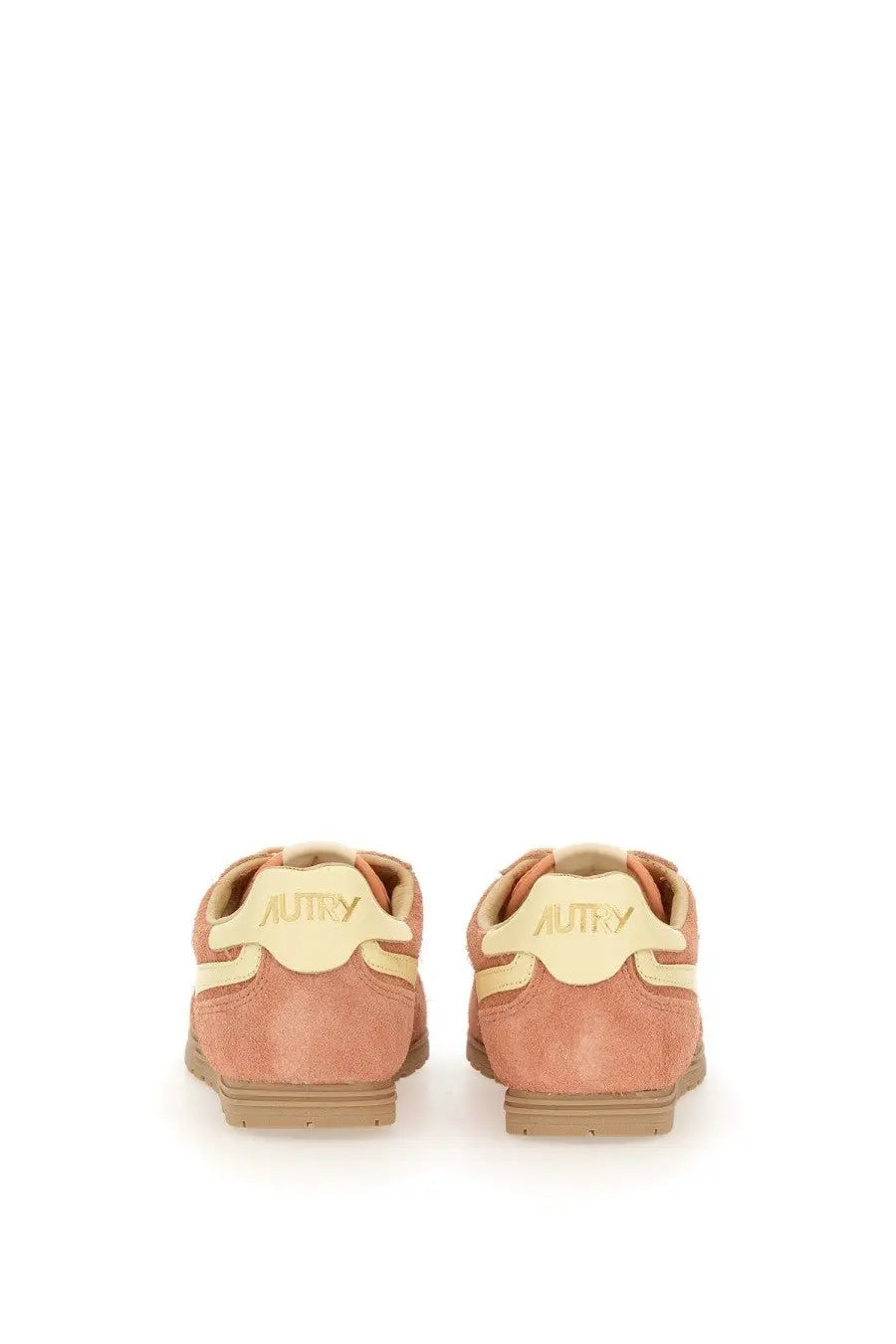 Autry women’s windspin low sneaker in dusty rose suede with cream branding and matching midsole