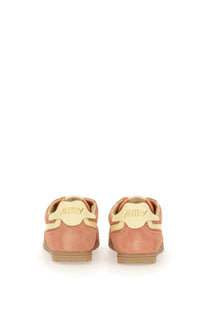 Autry women’s windspin low sneaker in dusty rose suede with cream branding and matching midsole