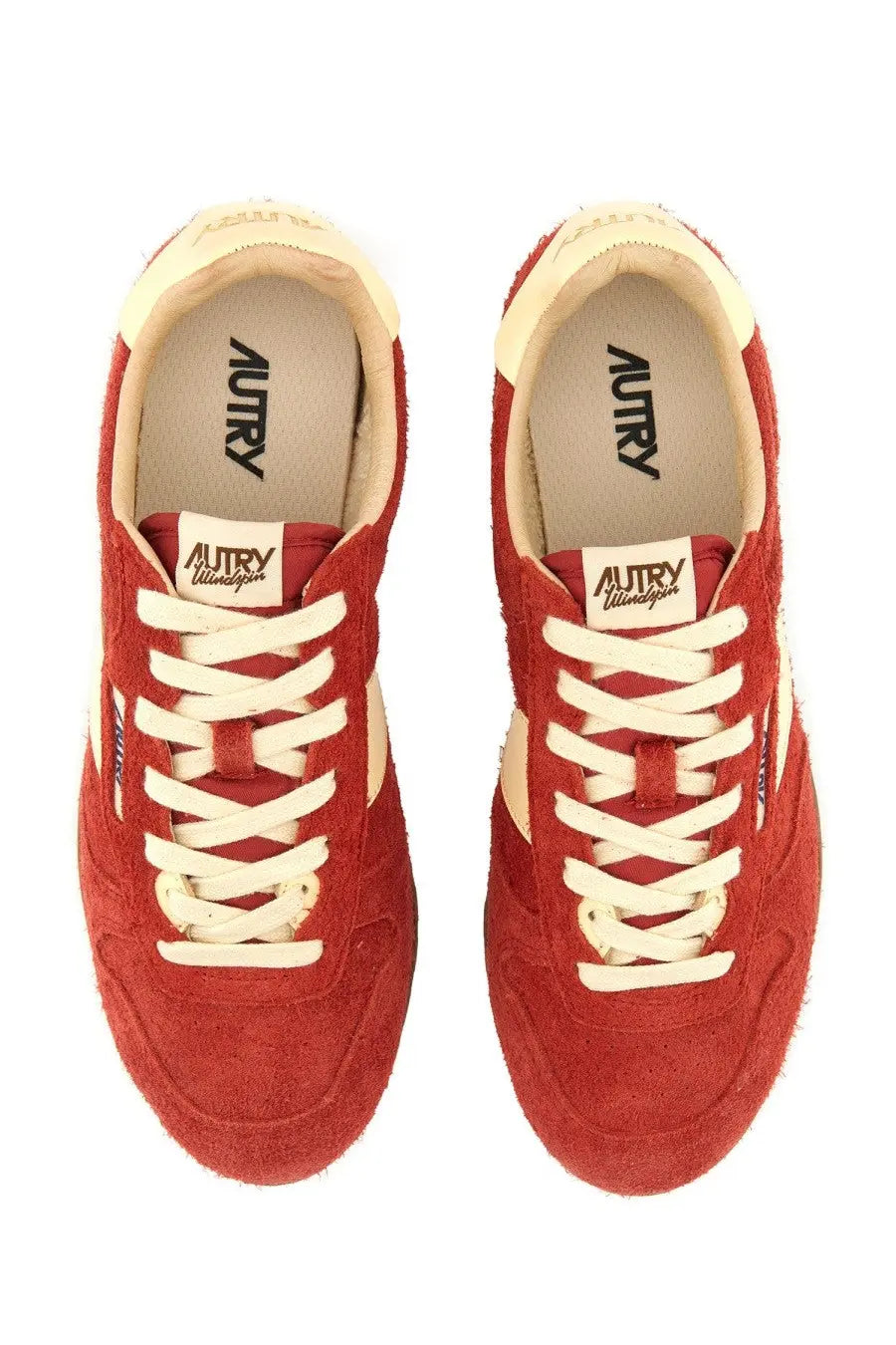 Autry women’s Windspin low sneaker in red suede with cream-colored laces and accents