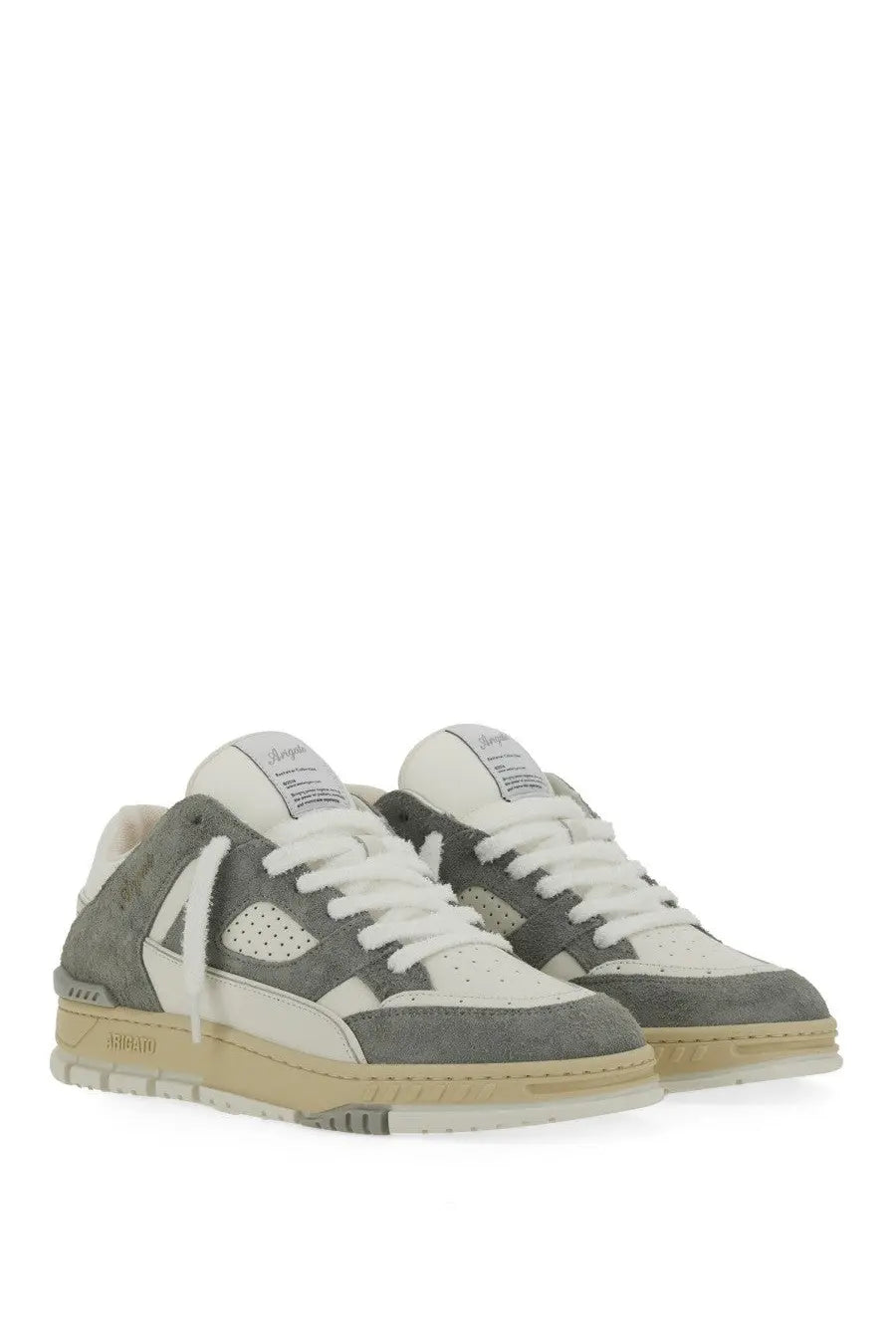 Back view of axel arigato men’s area lo low-top sneakers in gray and white suede and leather with beige sole and kawaii branding