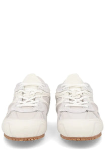 Axel Arigato men’s sneaker slow runner white in cream suede with rubber sole white laces and tan sole minimalist design