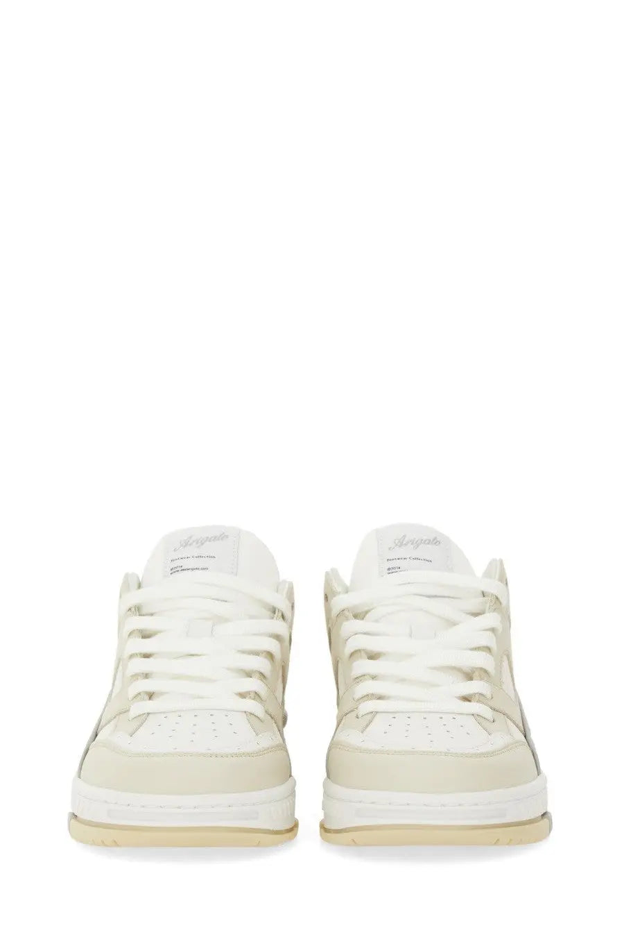 Axel Arigato women’s low-top sneaker in white and beige with a clean minimalist leather design