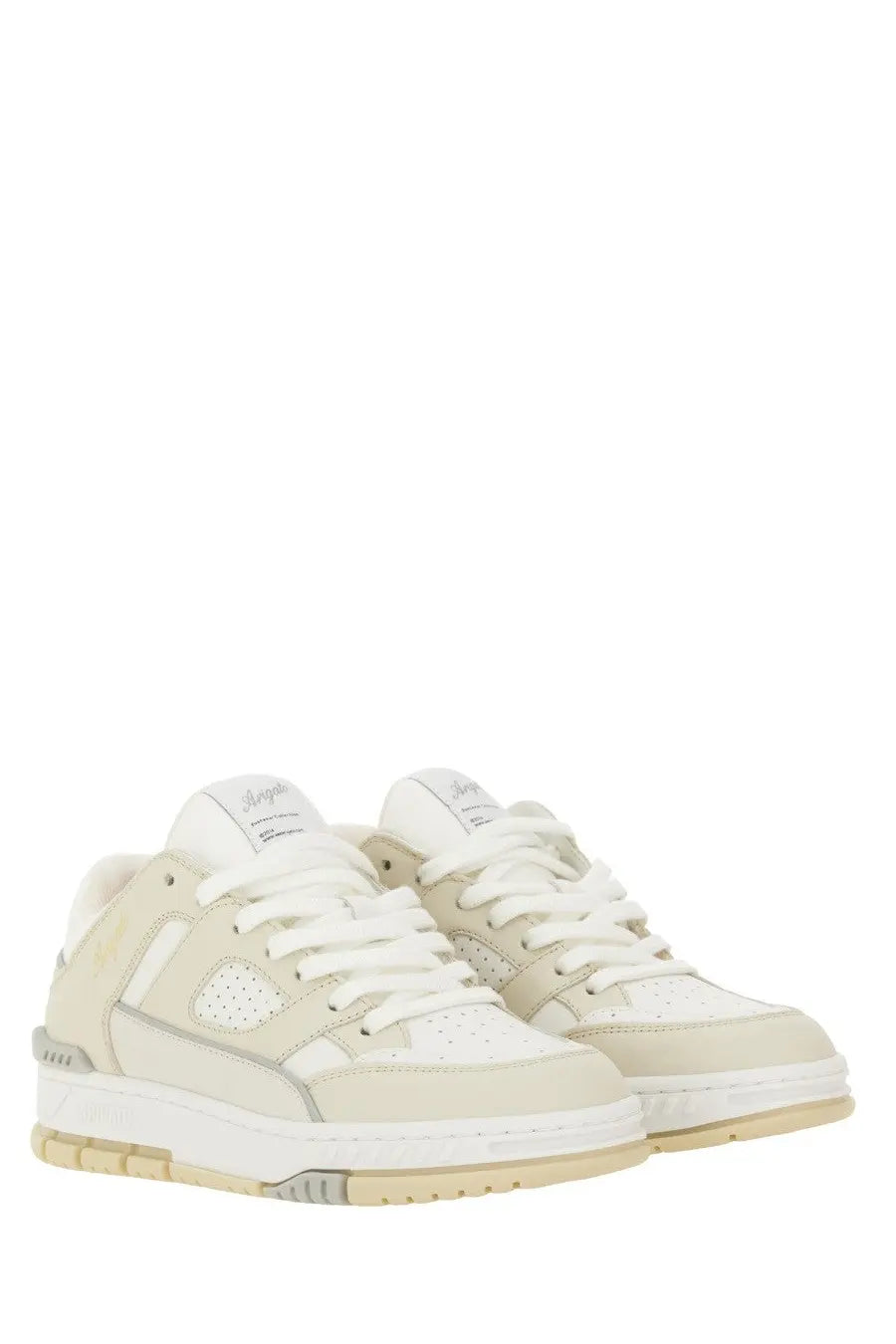 Cream-colored axel arigato women’s low-top sneakers with white laces perforated leather and synthetic layered design