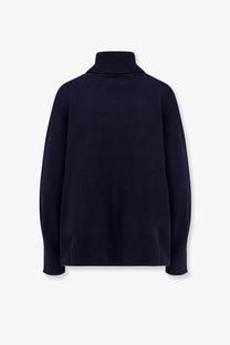 Axel Arigato women’s navy blue wool blend turtleneck sweater with ribbed texture and relaxed fit