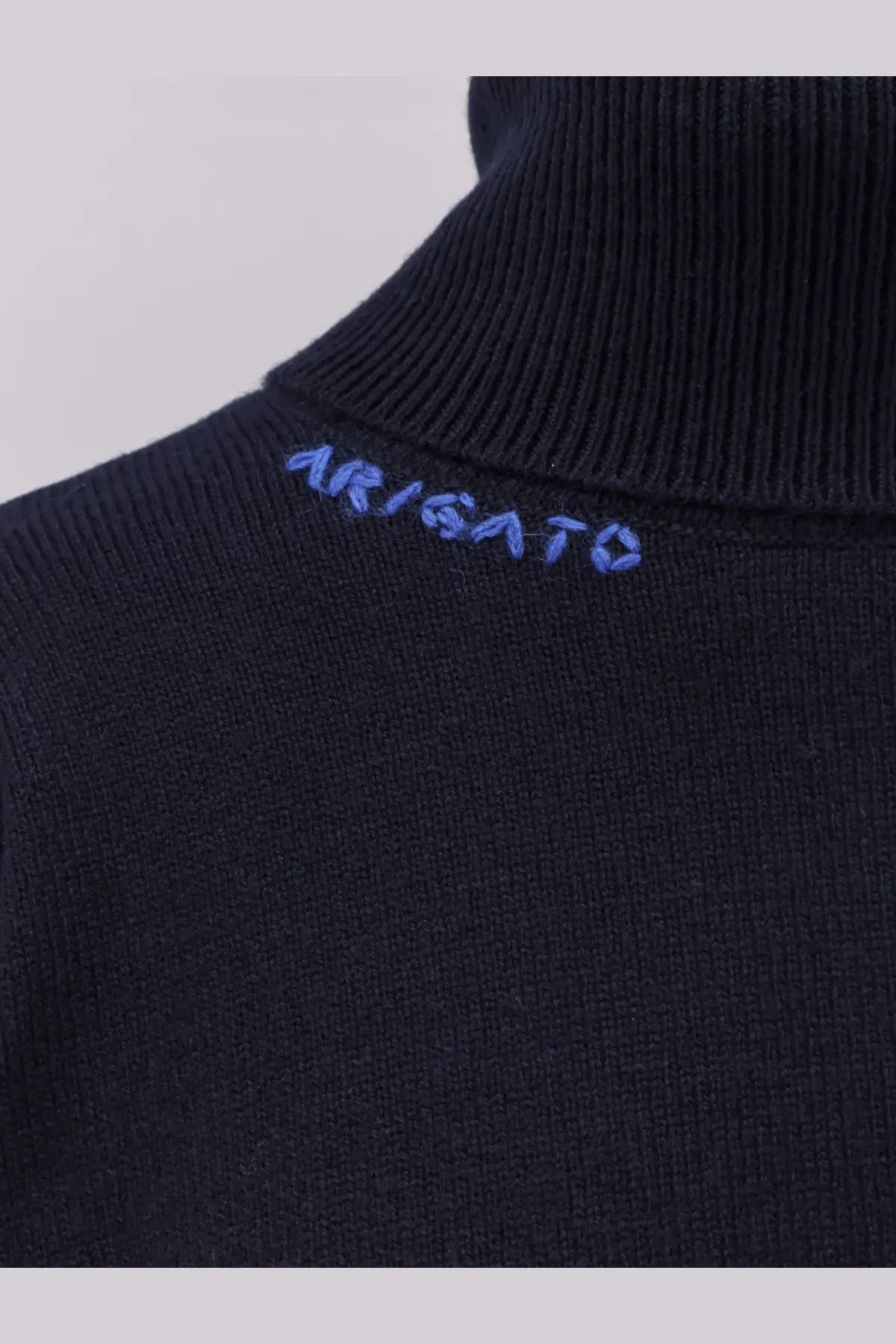 Axel Arigato women’s navy blue wool blend ribbed turtleneck sweater with arisato embroidered in purple on the collar