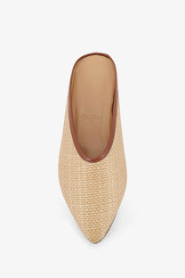Beige woven straw mule shoe with brown leather trim from babú milano women’s raffia sandals collection