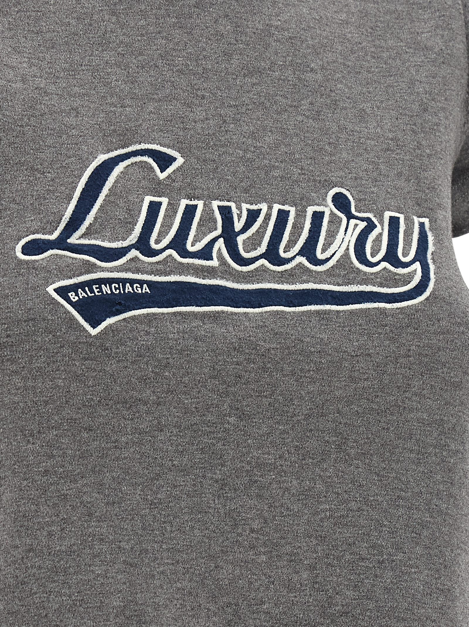 BALENCIAGA - BALENCIAGA - ’Shrunk Luxury Script’ T-shirt - Women’s Tops