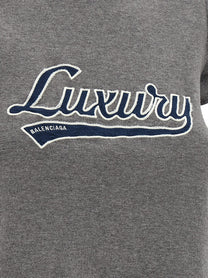 BALENCIAGA - BALENCIAGA - ’Shrunk Luxury Script’ T-shirt - Women’s Tops