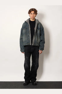 Balenciaga men’s black distressed denim jacket with hood and front zipper made from dark denim material