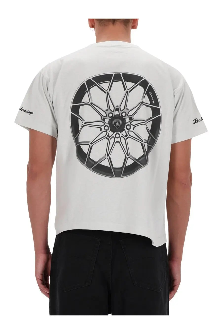 Back side of balenciaga mens boxy fit white t shirt featuring a large black and silver lamborghini wheel graphic