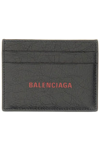 Balenciaga men’s cash card holder in black cracked leather with red balenciaga logo on the front