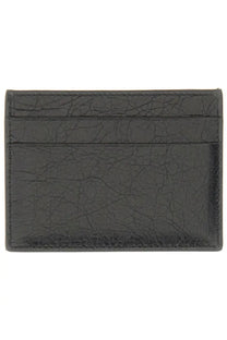 Balenciaga men’s cash card holder in black textured leather with visible stitching along the edges