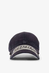 Balenciaga men’s black cotton baseball cap with dark denim and distressed faded white logo on front brim