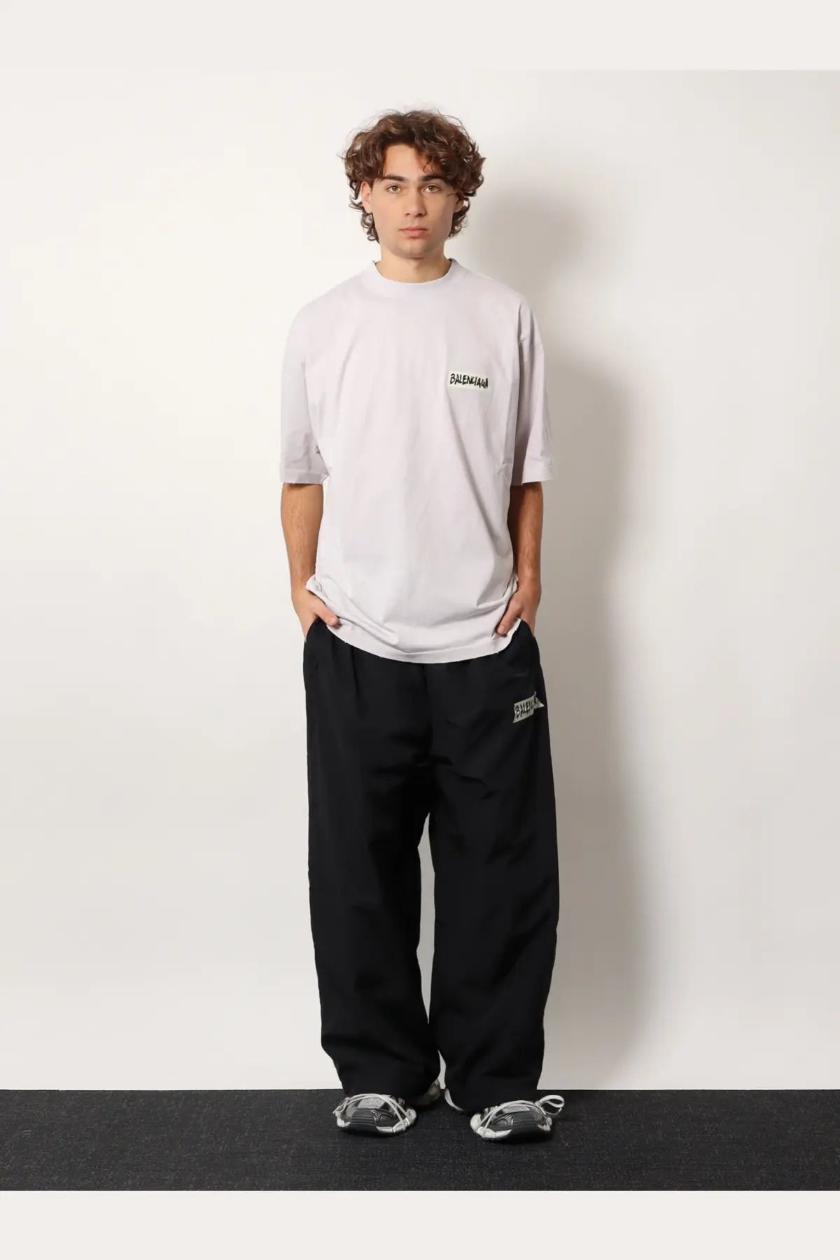 Balenciaga men’s white cotton t-shirt with black logo on the left chest for casual wear
