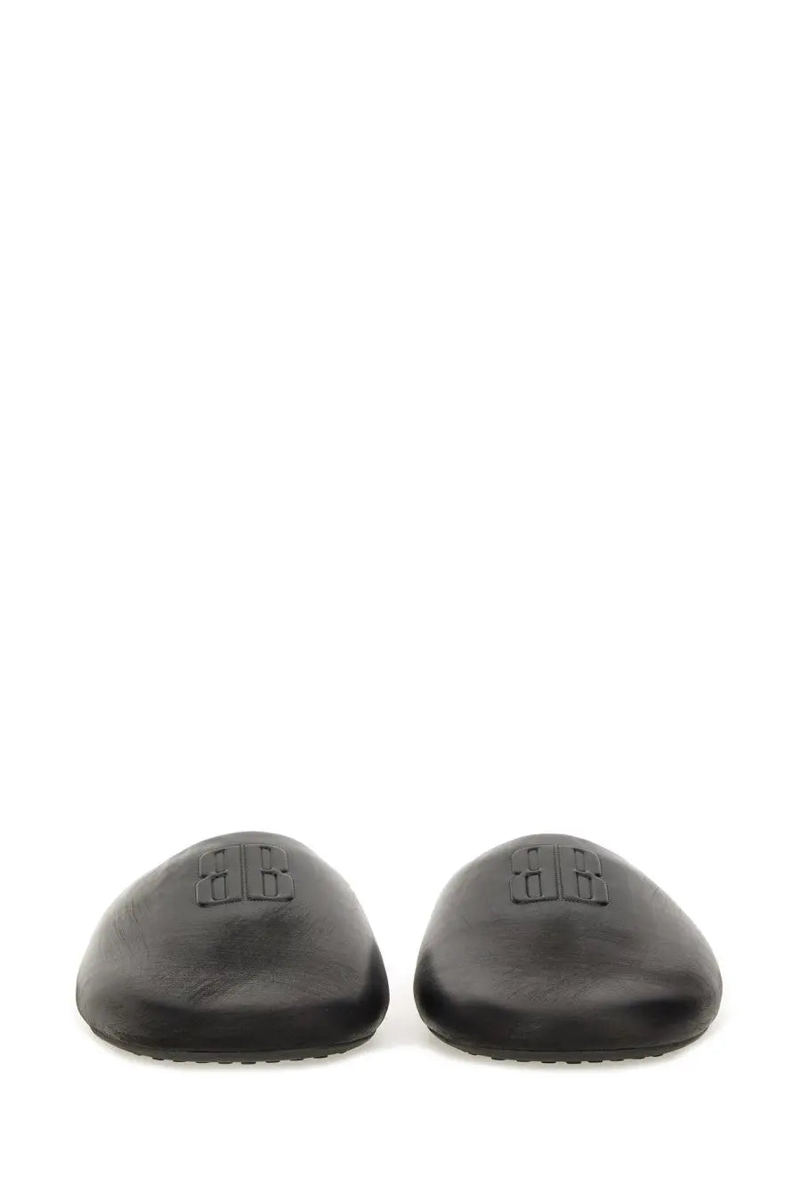 Balenciaga men’s black leather slip-on mules with minimalist embossed logo on vamp flat sabot style