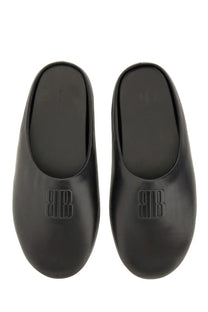 Balenciaga men’s flat sabot mules in black leather with embossed bb logo on the vamp
