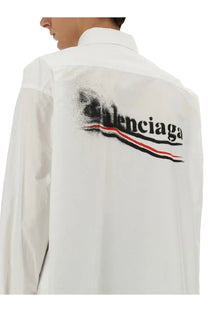 Balenciaga men’s large fit white shirt with bold spray-painted black logo and red and black stripes on front