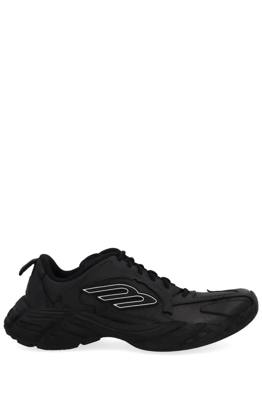 Balenciaga men’s monday shoe sneaker in black with bold chunky sole and white logo detailing on leather material