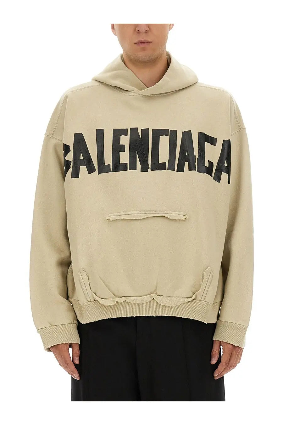 Beige Balenciaga men’s tape type sweatshirt with bold black lettering and front pocket in a comfortable hoodie style