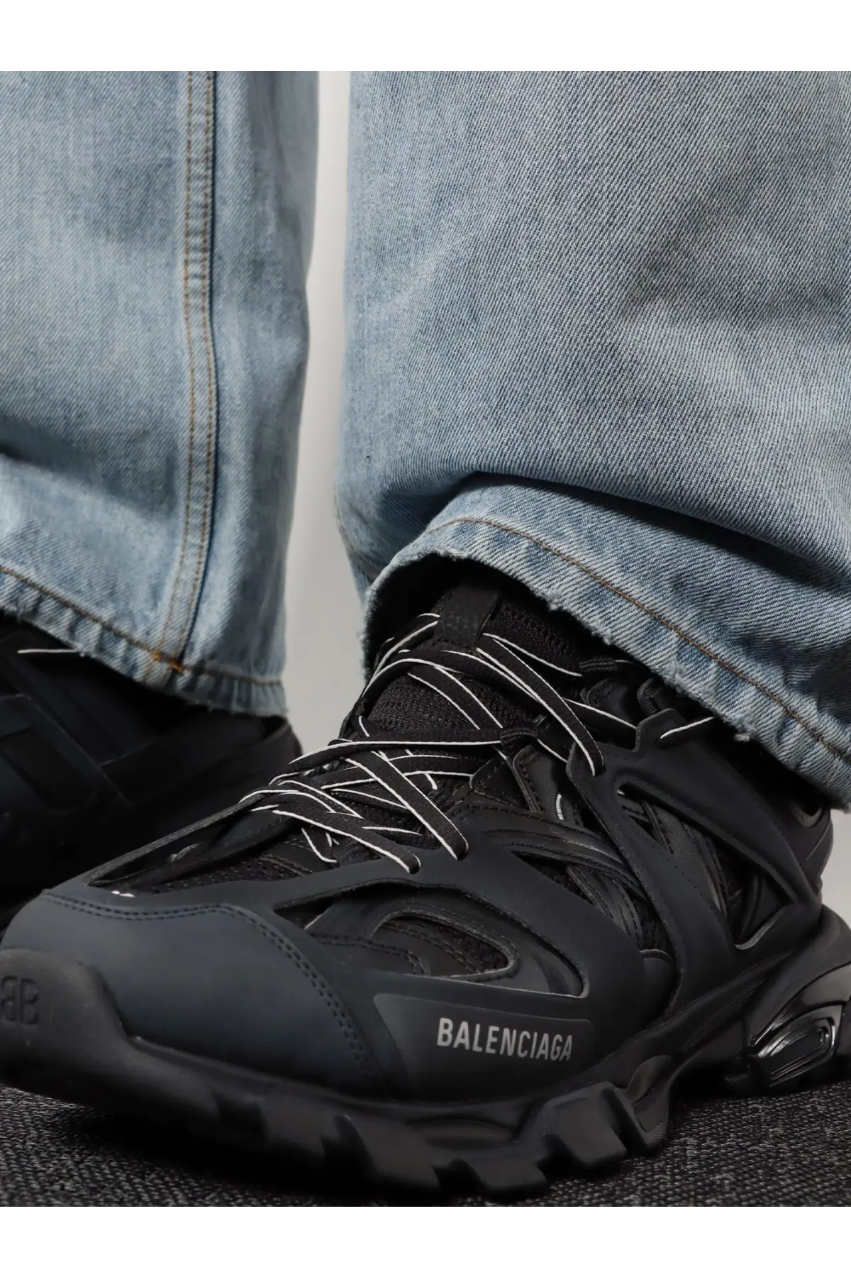 Balenciaga men’s track nylon and mesh sneakers black with white laces and chunky rubber sole front view