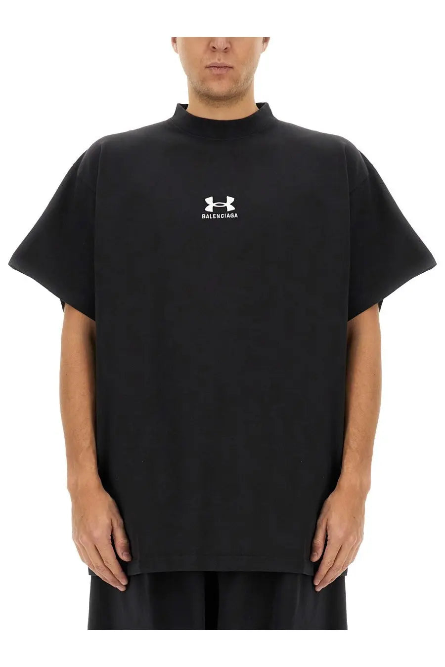 Black balenciaga unisex oversize shirt featuring a white logo on the chest in a comfortable cotton material