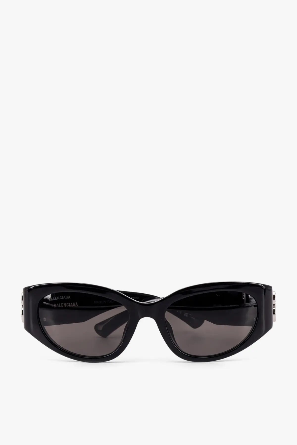 Black balenciaga women’s acetate sunglasses with sleek cat-eye frame and dark gray lenses