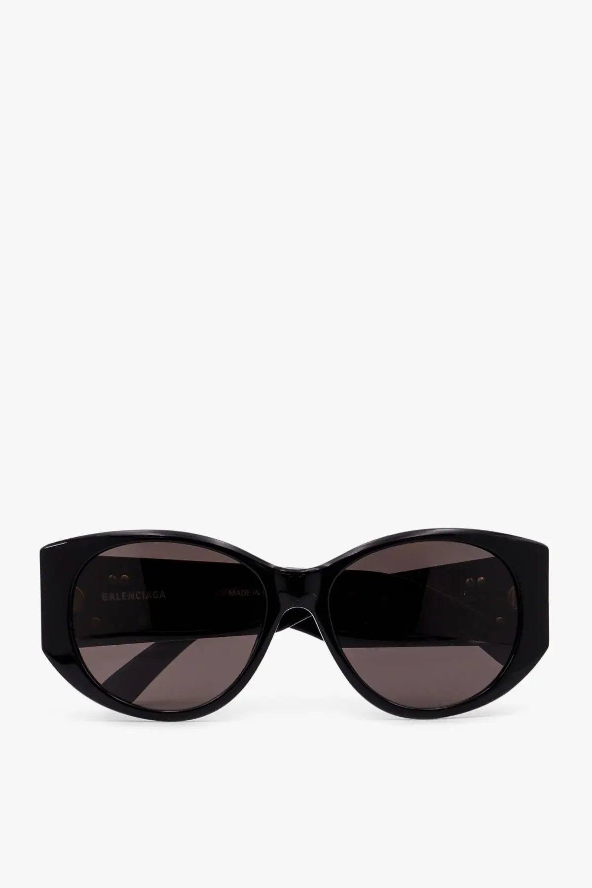 Balenciaga women’s black acetate sunglasses with dark gray lenses and sleek cat-eye frame design