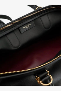 Balenciaga women’s bolero bowling medium leather bag black with gold-tone zippers and hardware in black leather